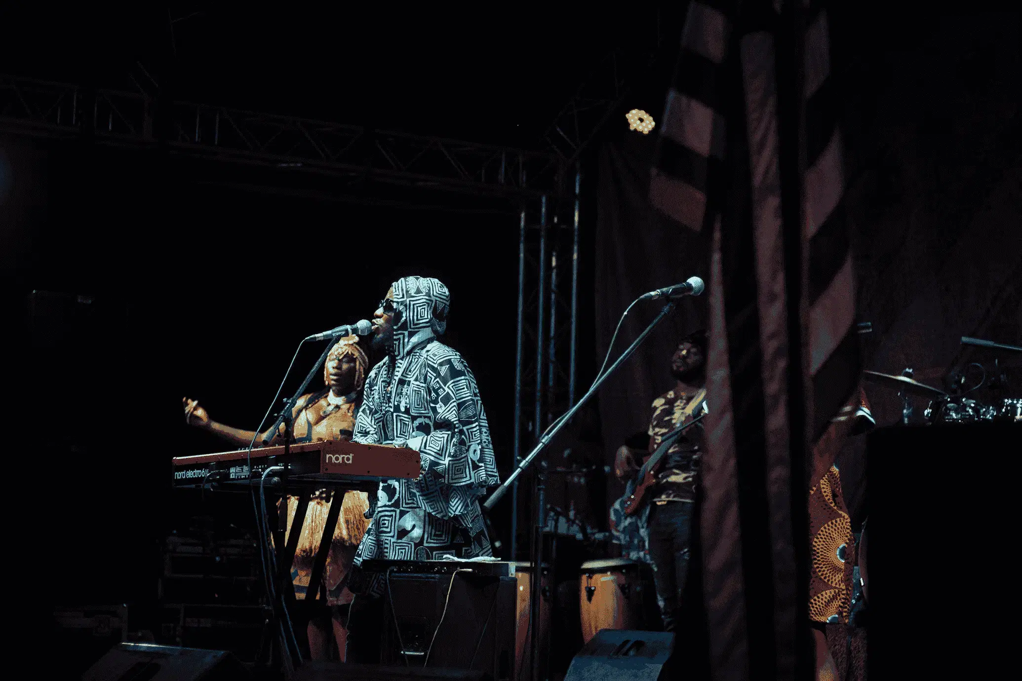 Musician and dancers performing on stage